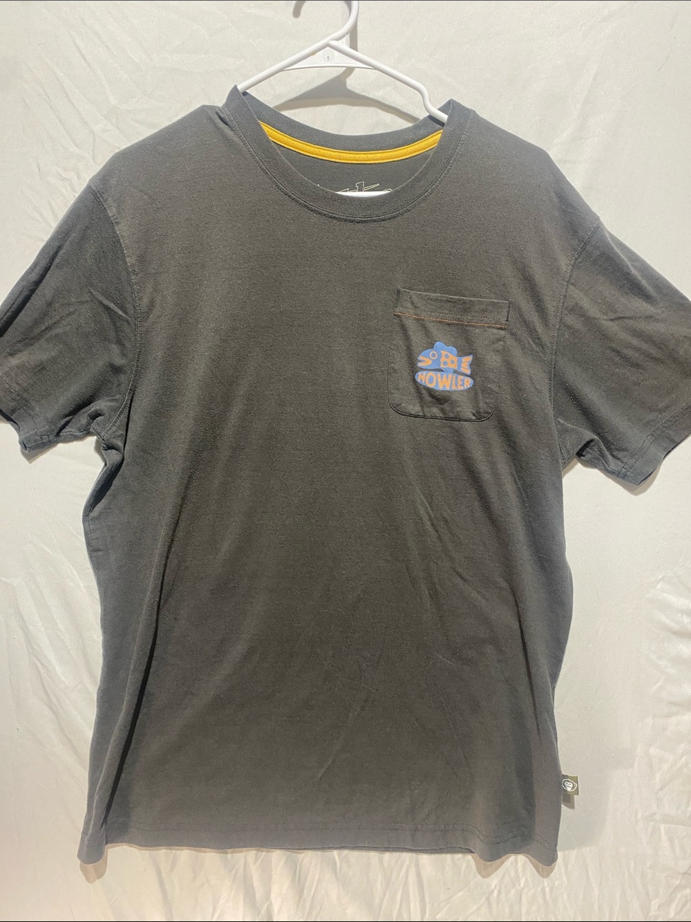 Howler Brothers Black Short-Sleeve Pocket Tee with Blue & Orange Logo